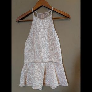 Pink and white flowered peplum top